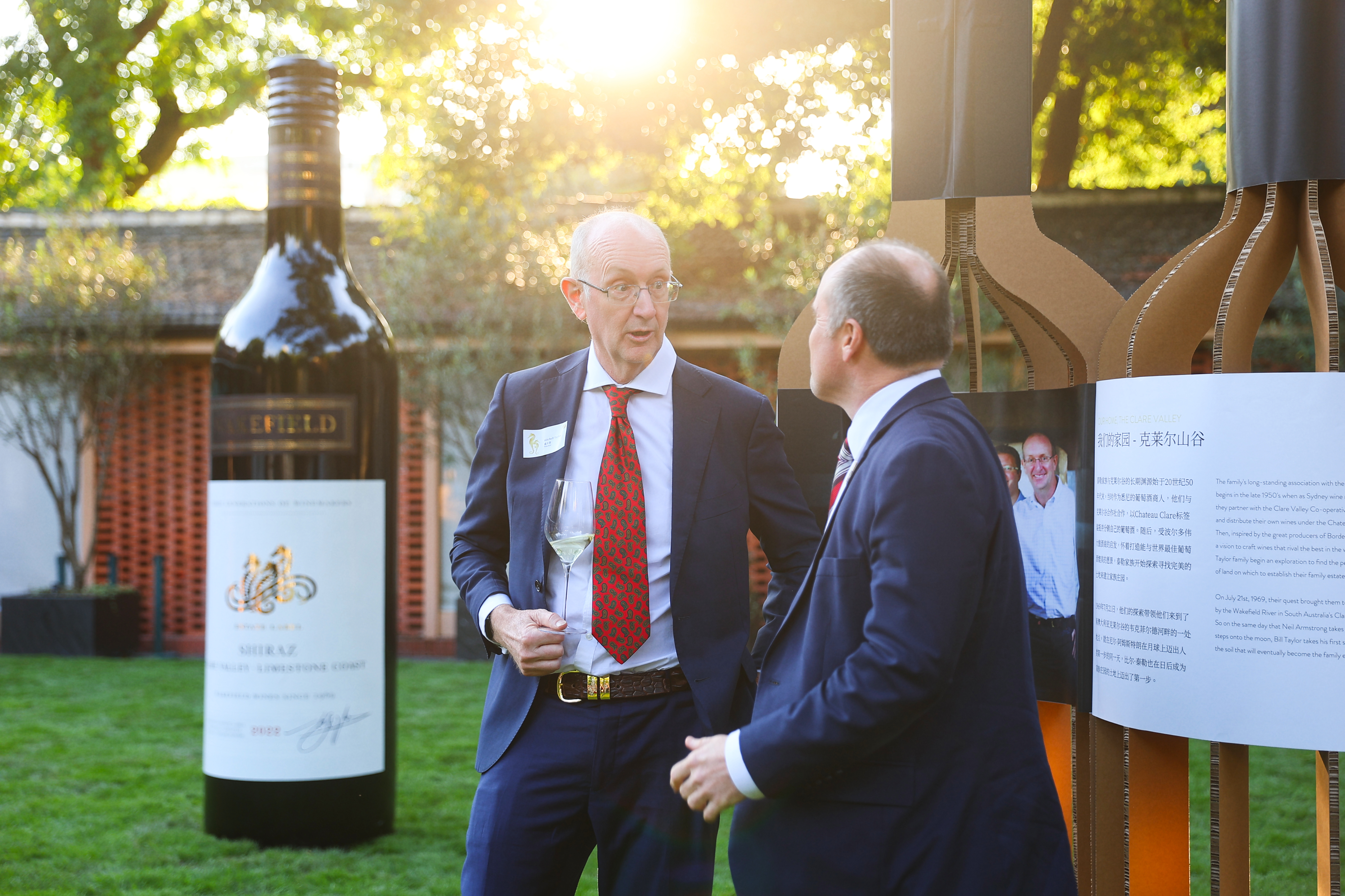 Wakefield guests speaking beside the outdoor brand installation