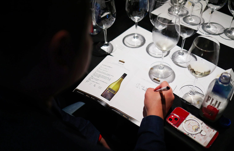 Wakefield guest using a tasting card